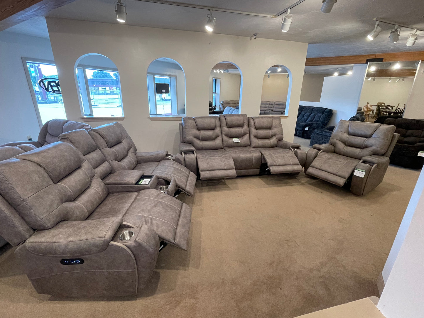 a living room filled with lots of furniture