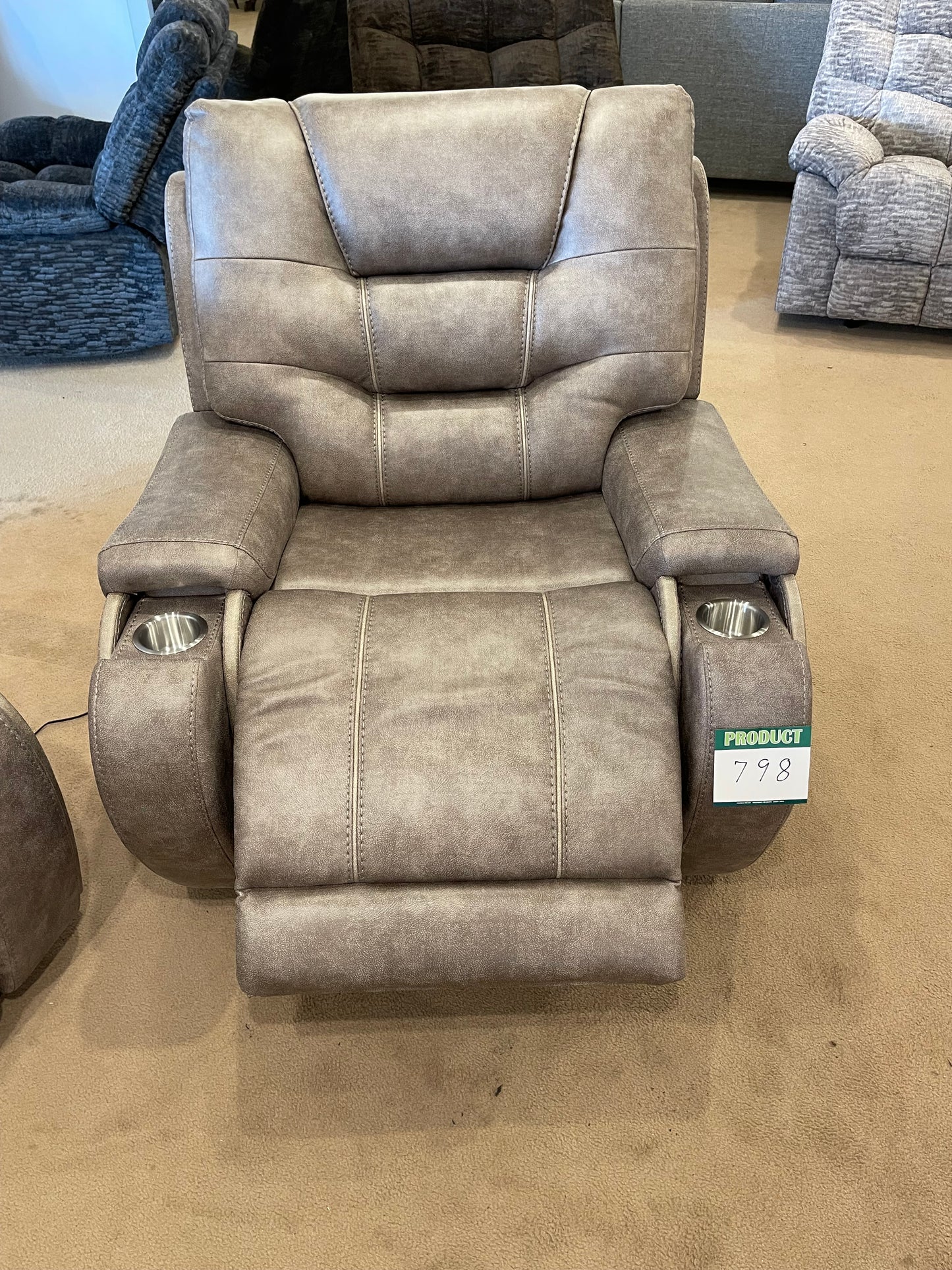 a couch sitting in a living room next to a couch