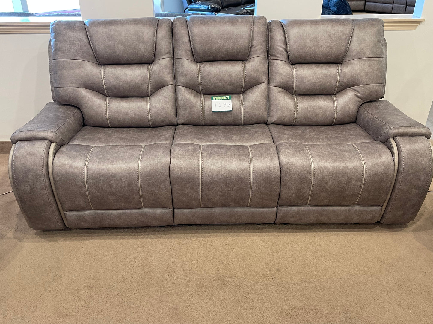 a couch with a bunch of pillows on it