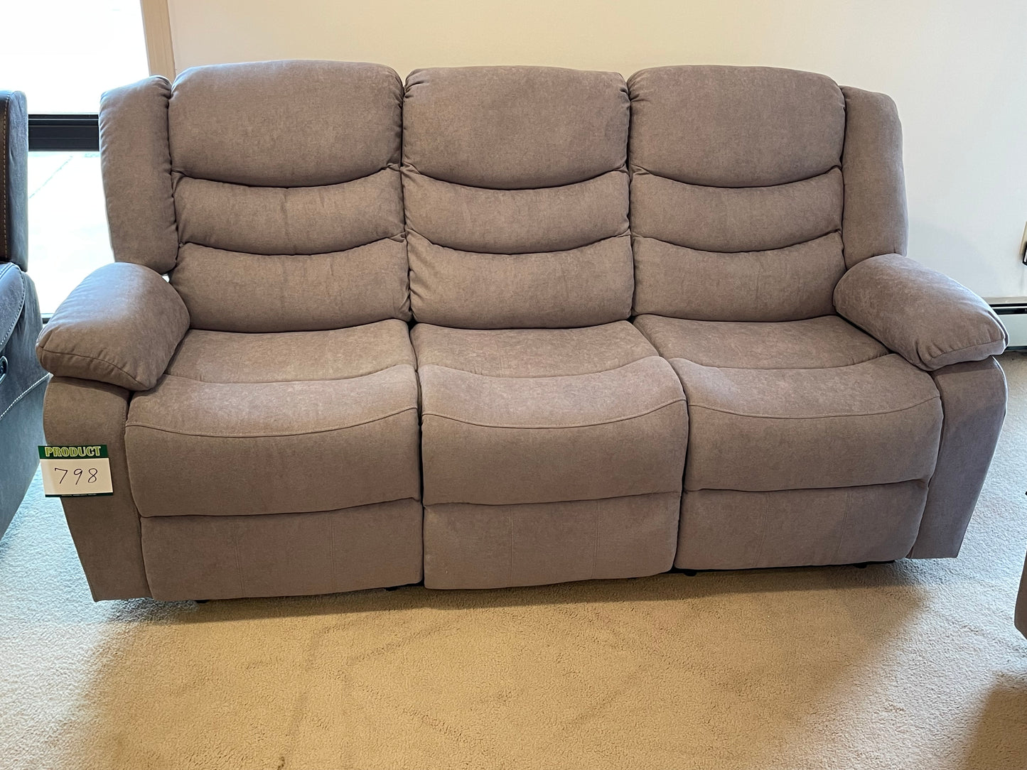 a living room with a couch and a couch