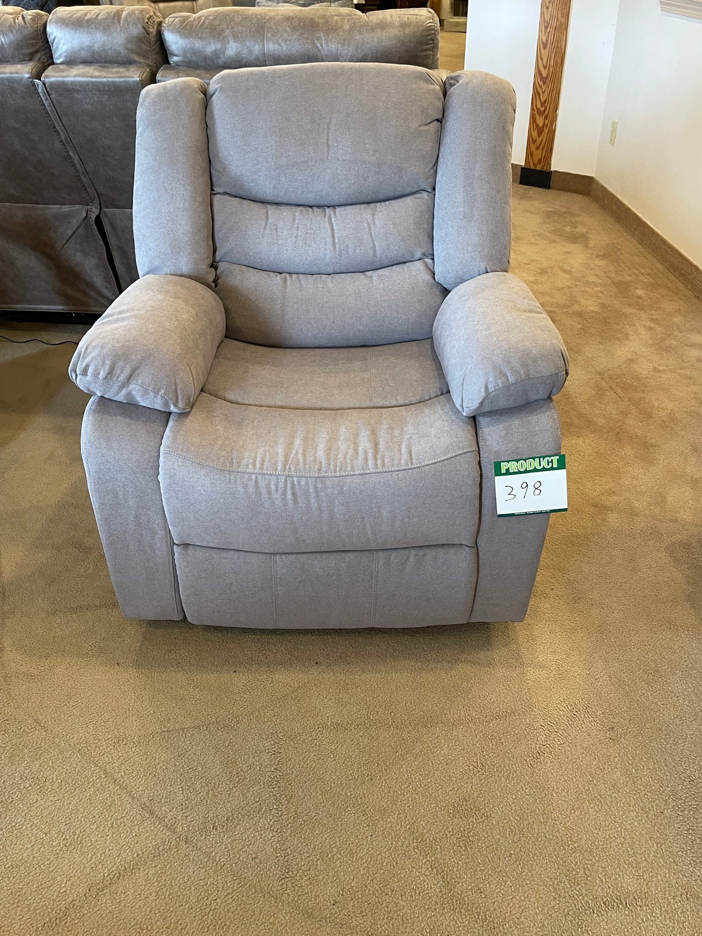 a couch sitting in a living room next to a couch