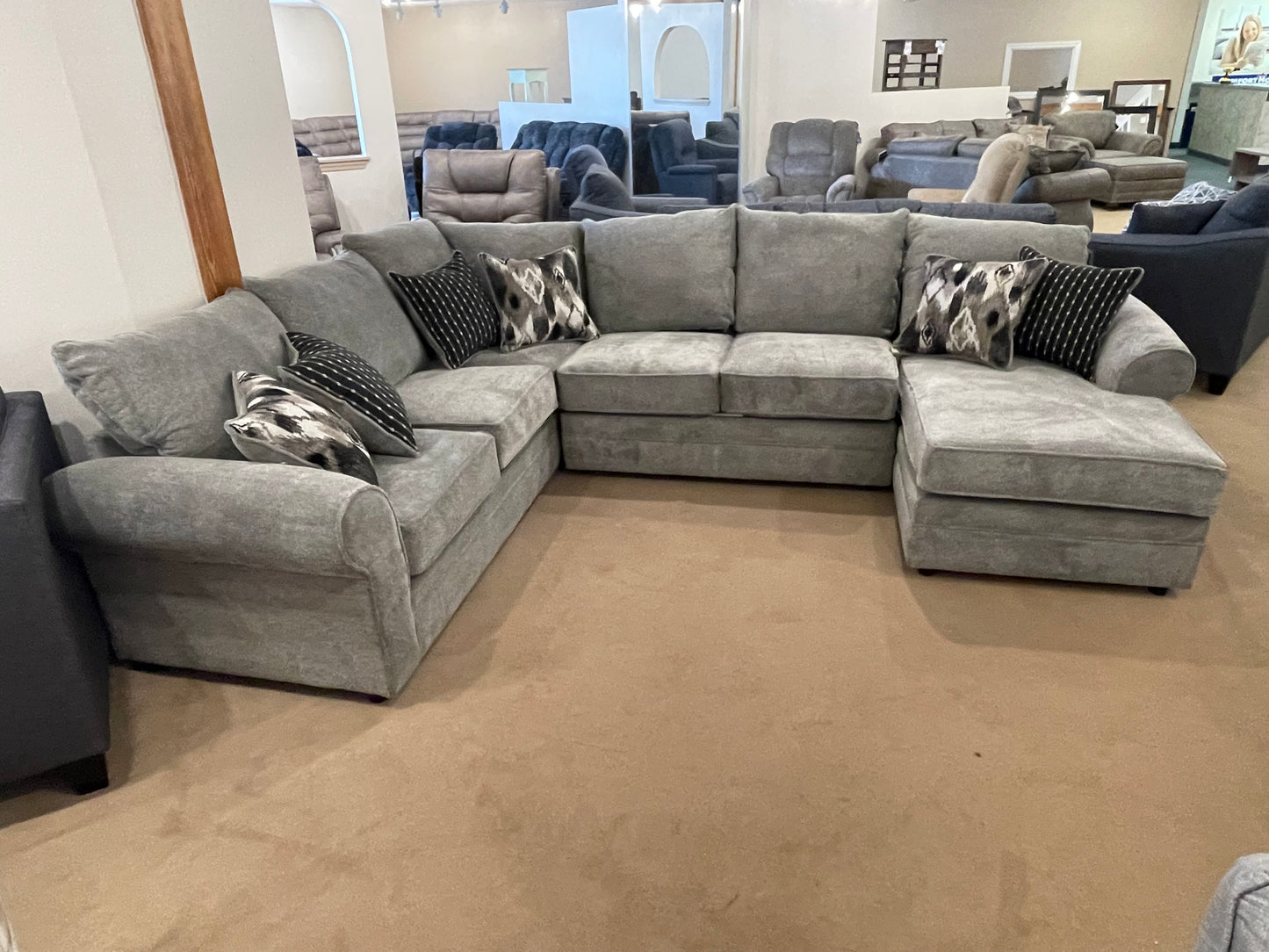 a living room filled with furniture and a couch