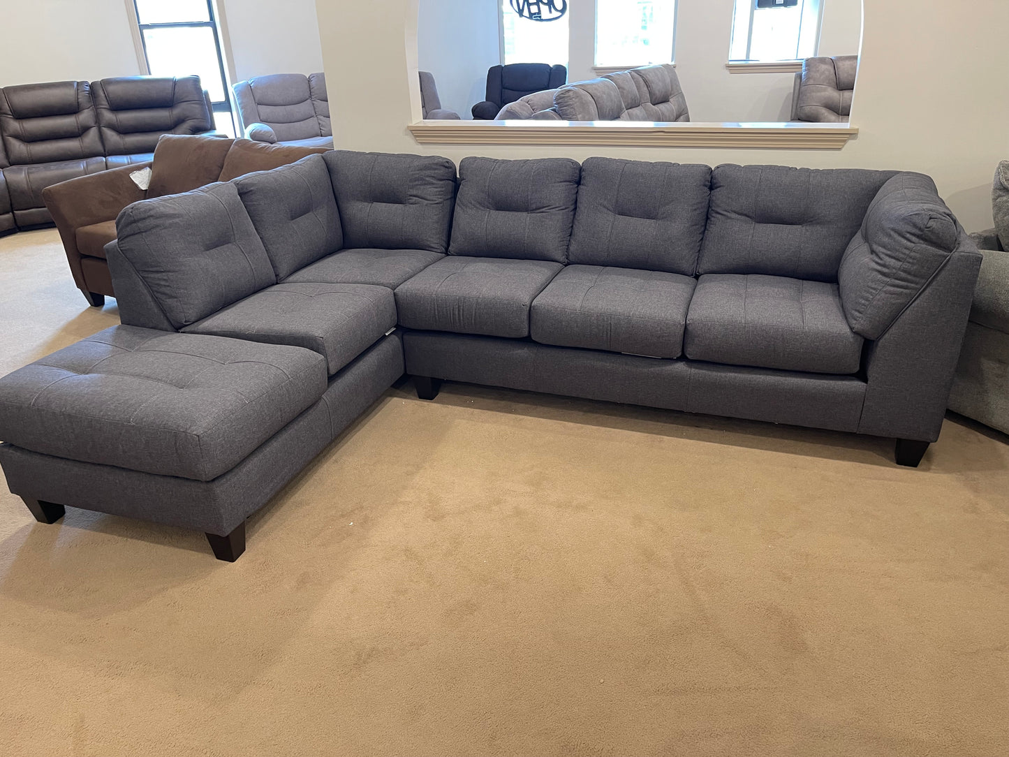 a living room filled with furniture and a couch