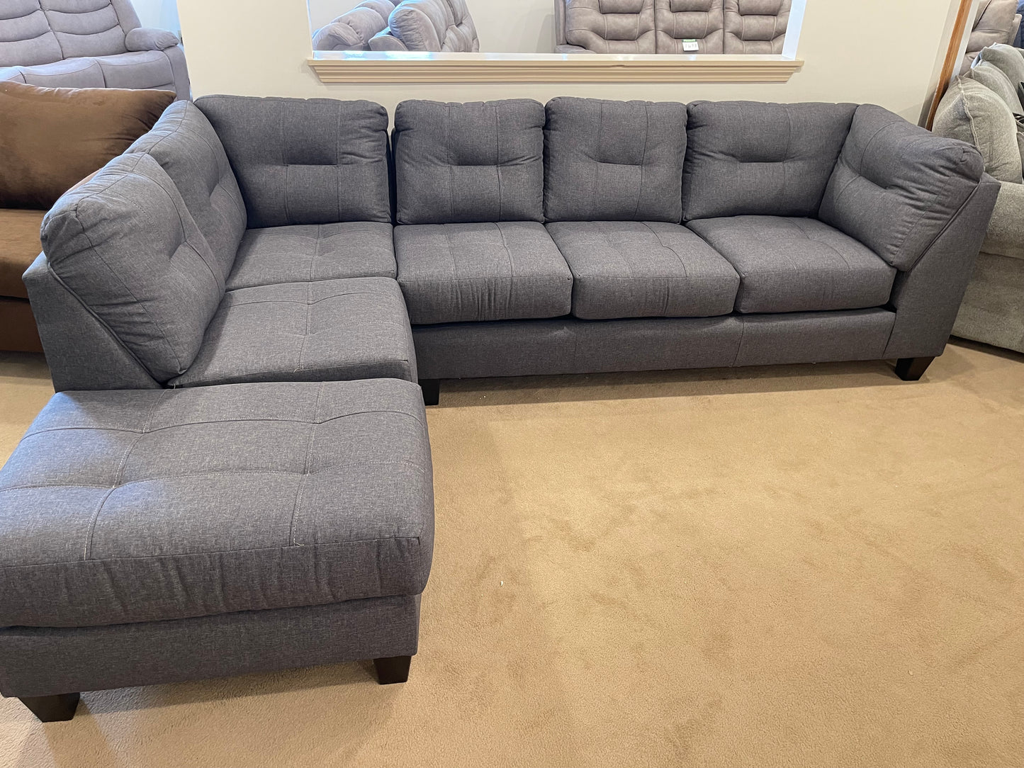 a living room filled with furniture and a couch