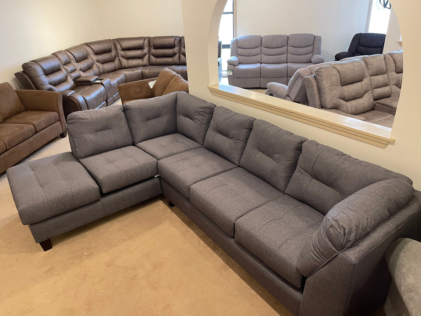 a living room filled with furniture and a couch