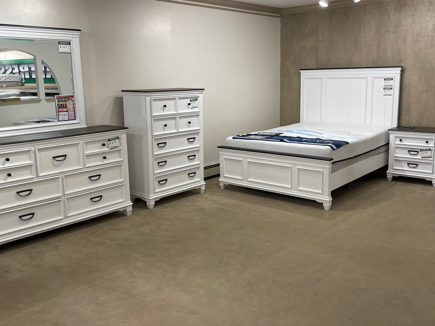 a room with a bed and a desk