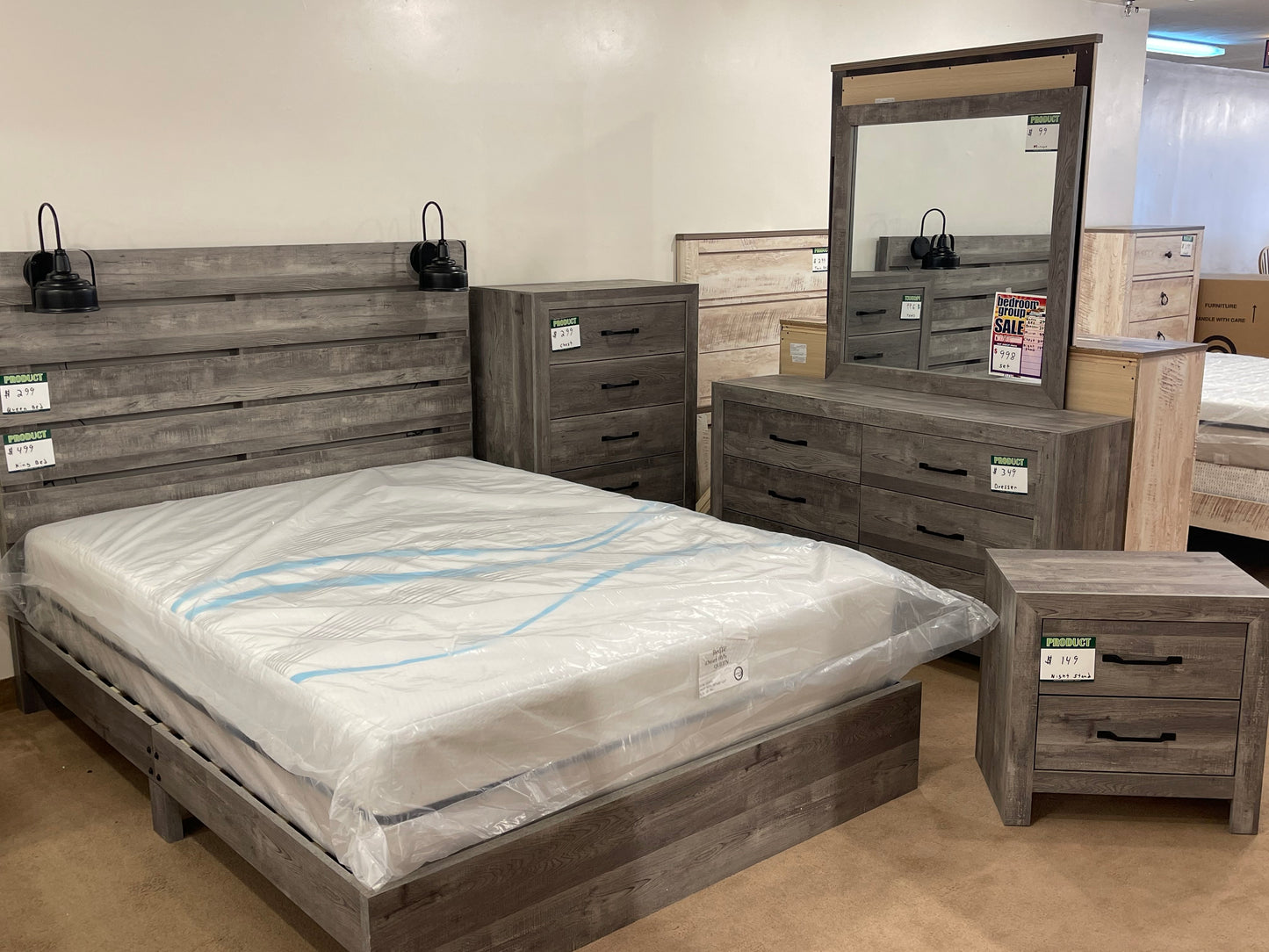 a bed sitting in a room next to a window