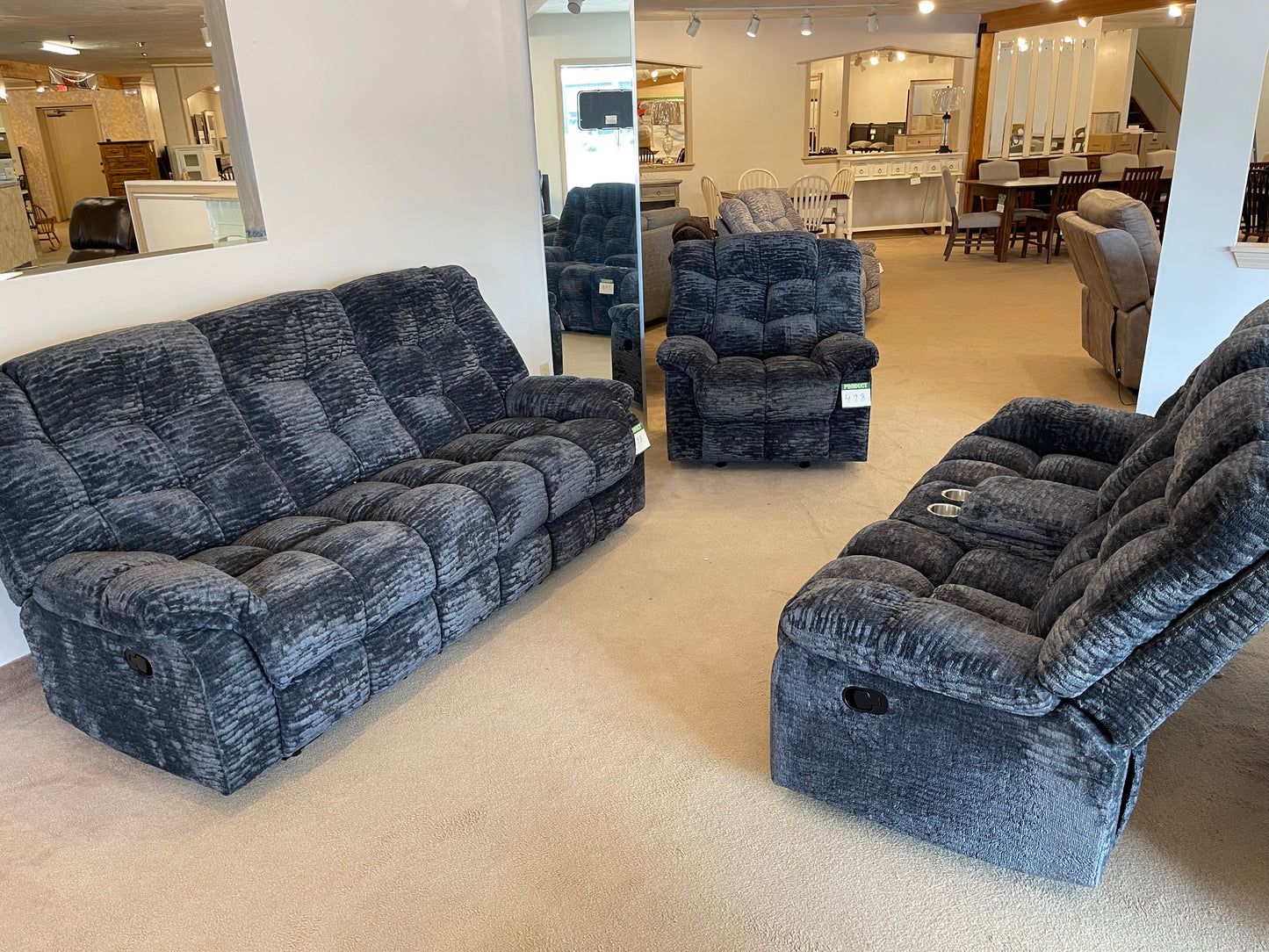 a living room filled with furniture and a couch 