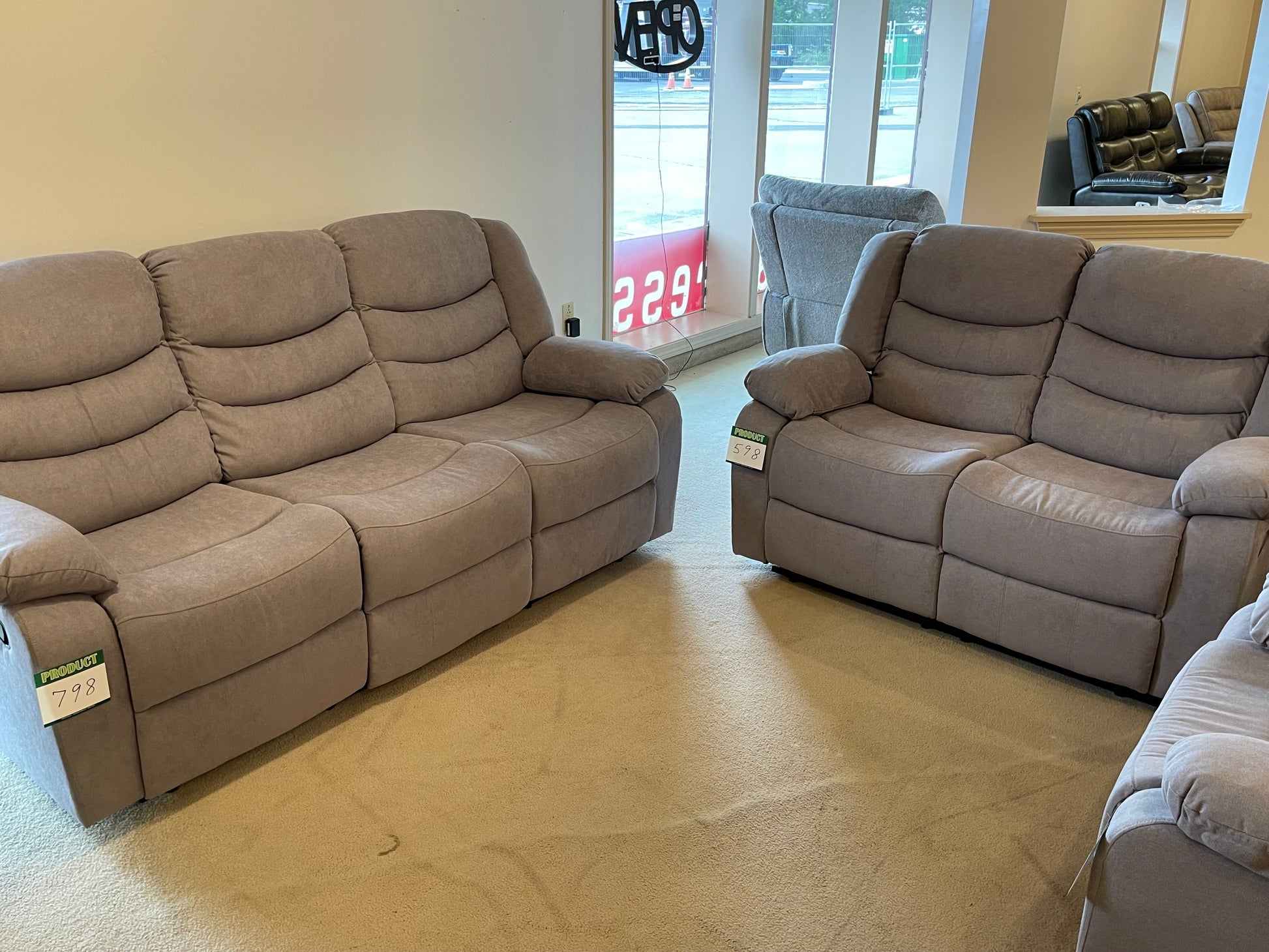 a living room filled with furniture and a couch 