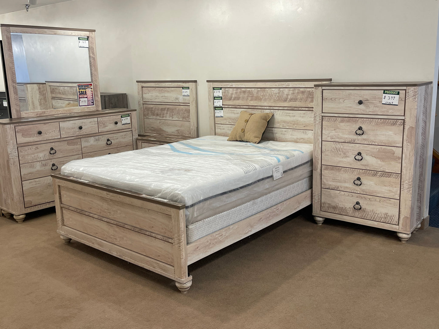 a bed room with a bed and a dresser 